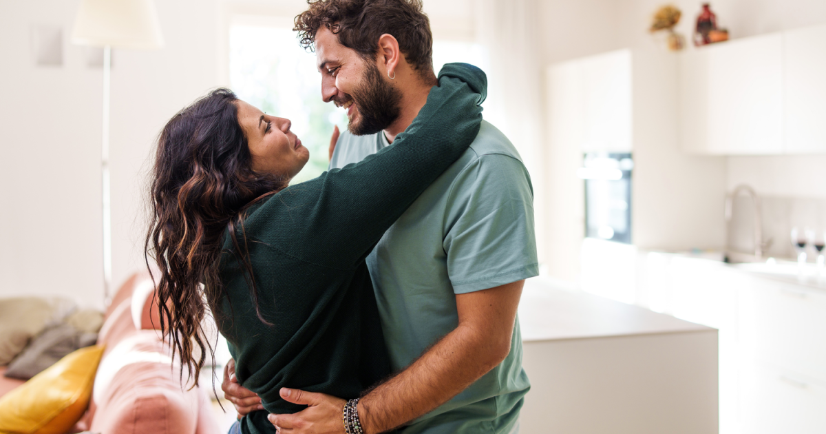 A loving couple embraces each other warmly, reflecting newfound understanding and commitment to stop the blame game in their relationship. Their successful experience at Loving at Your Best Marriage and Couples Counseling in New York, NY, has helped them grow closer and create a healthier partnership.