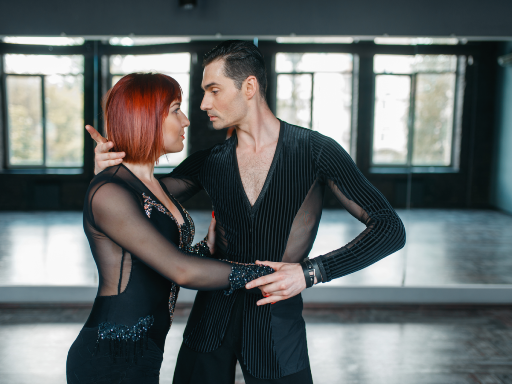 A couple preparing to dance, their poised stance reflecting the positive impact of effective online couples therapy for OCPD at Loving at Your Best Marriage and Couples Counseling in New York City, showcasing the accessibility and transformative power of their treatment in fostering a stronger connection and understanding.