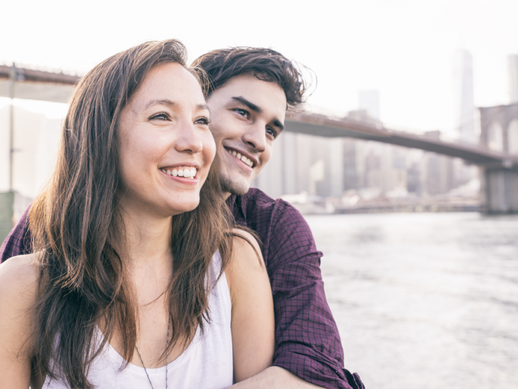 Image of couple by Brooklyn Bridge in New York City getting couples therapy