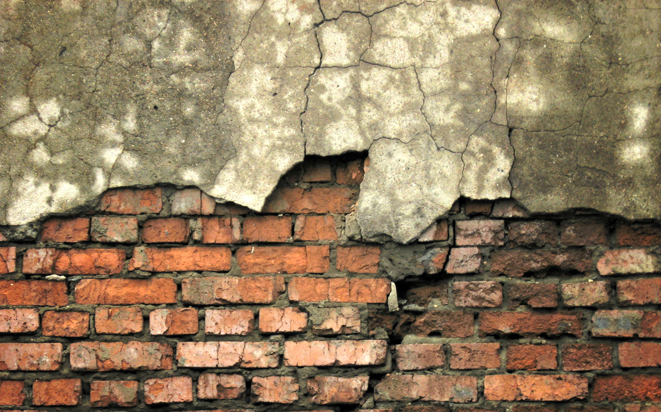 Visual metaphor of cracking house foundation representing how infidelity activates deep schema wounds and requires specialized therapy approaches.