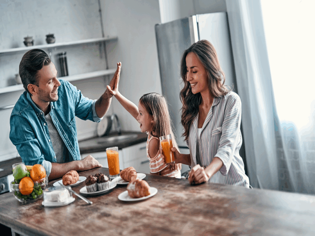 Stressed Manhattan parents experiencing morning parenting conflicts while getting kids ready for school - couples therapy can help